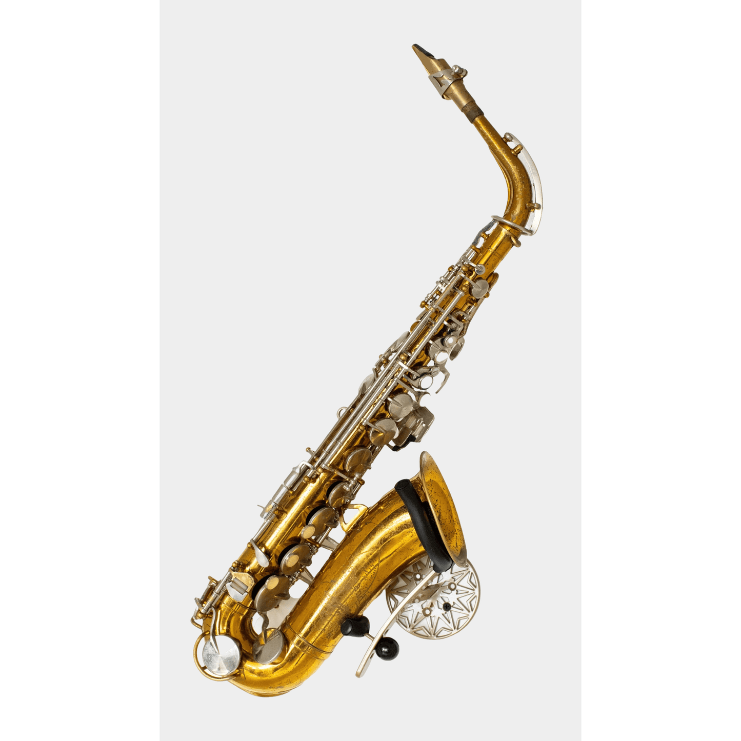 Triumph alto saxophone in wallmount Samba Gold on white wall by Locoparasaxo.com
