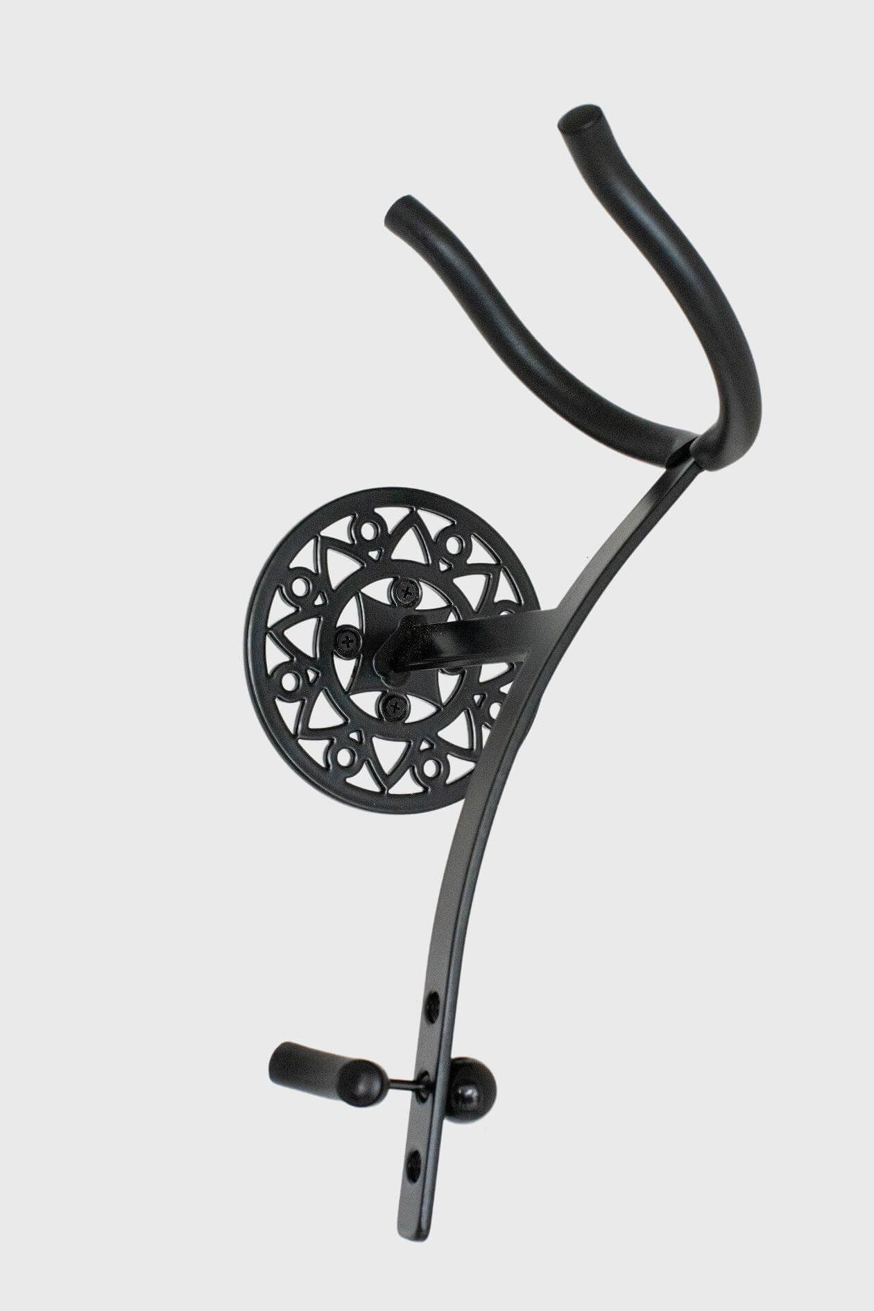 angled photo of baritone saxophone wallmount Aztec on white wall by Locoparasaxo.com