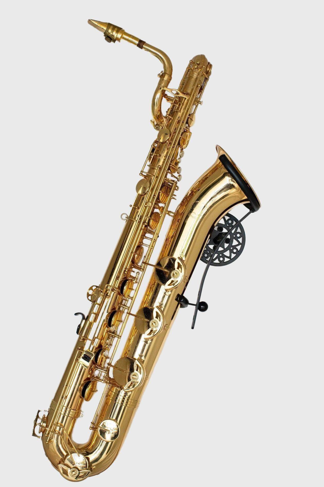 full view of baritone saxophone in wall stand Aztec on white wall by Locoparasaxo.com