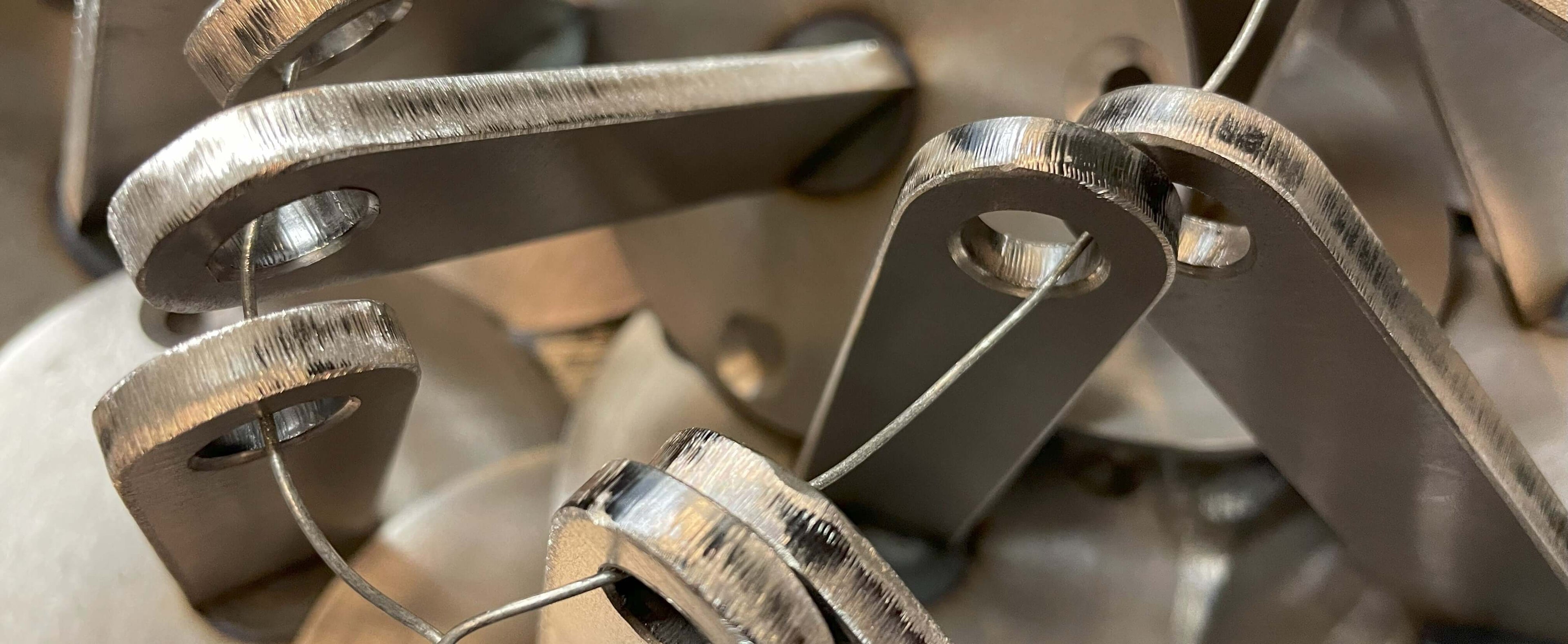  work photo of production of welded saxophone stands