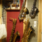 studio wall with four saxophones close together in Locoparasaxo wallmounts