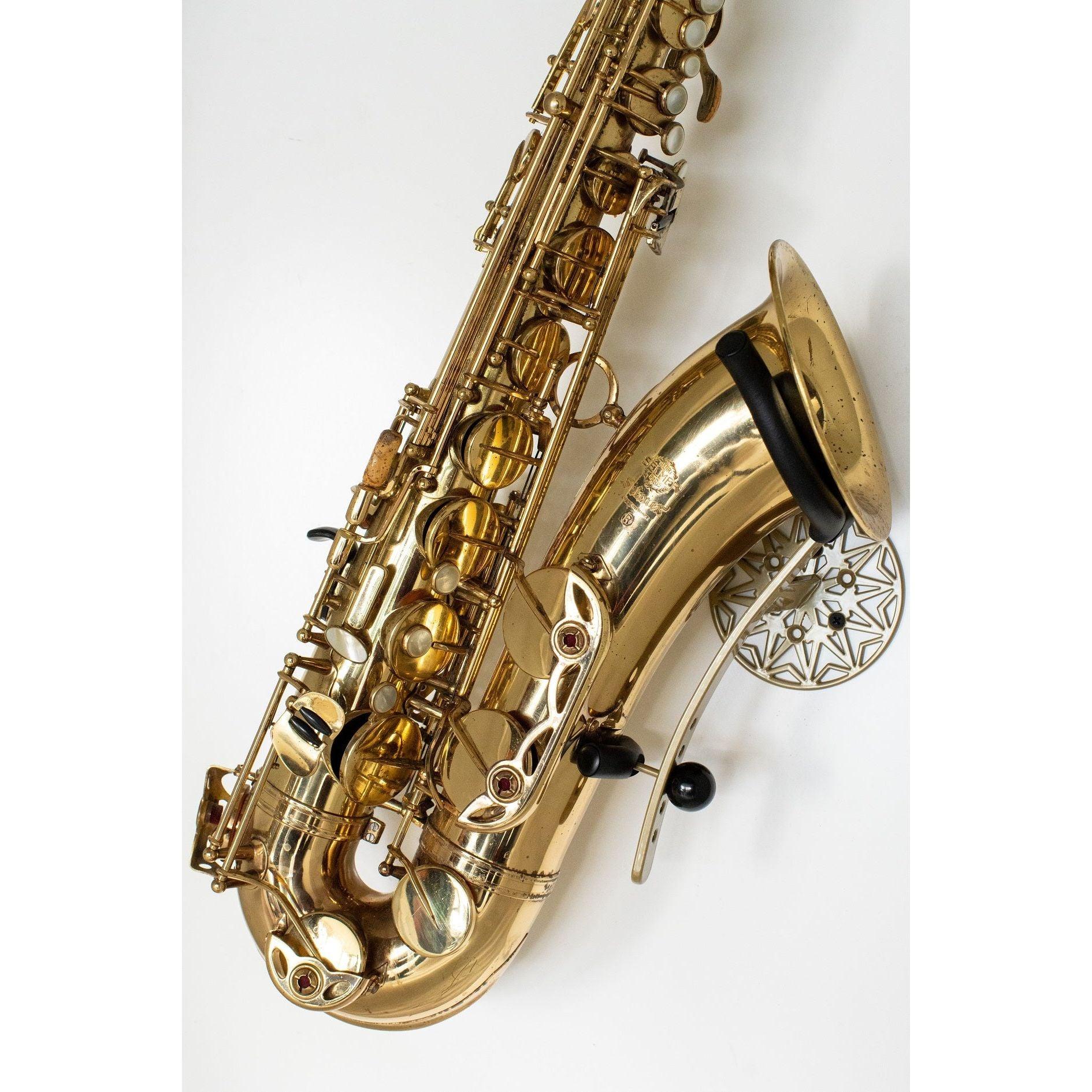 gold Selmer Mark 7 tenor saxophone in wallmount Samba on white wall by Locoparasaxo.com