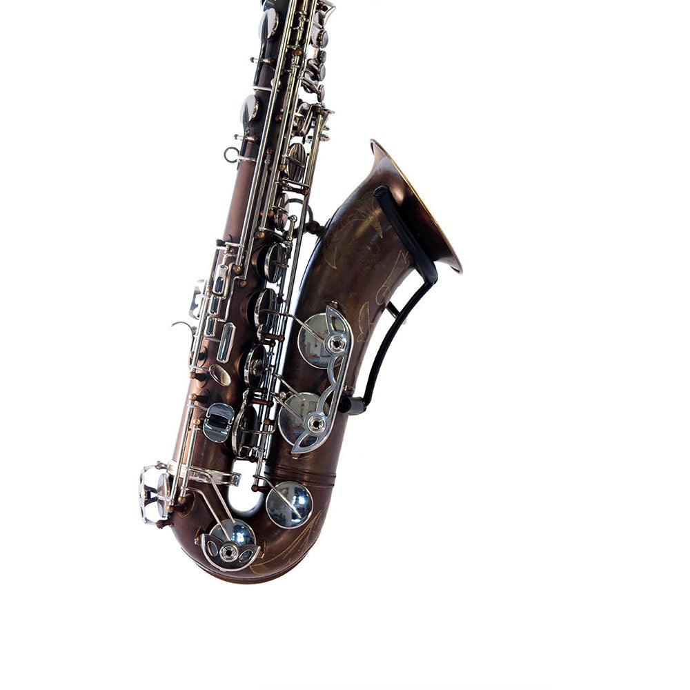 tenor saxophone brass and chrome resting in black steel wallmounted stand for saxophone Soul Prop on white backdrop, locoparasaxo product picture