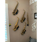 customer wall dedicated to music with five saxophones alto soprano in Locoparasaxo wallmounted stand
