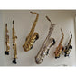 collection of six different saxophones in cluster mounted in Locoparasaxo stands